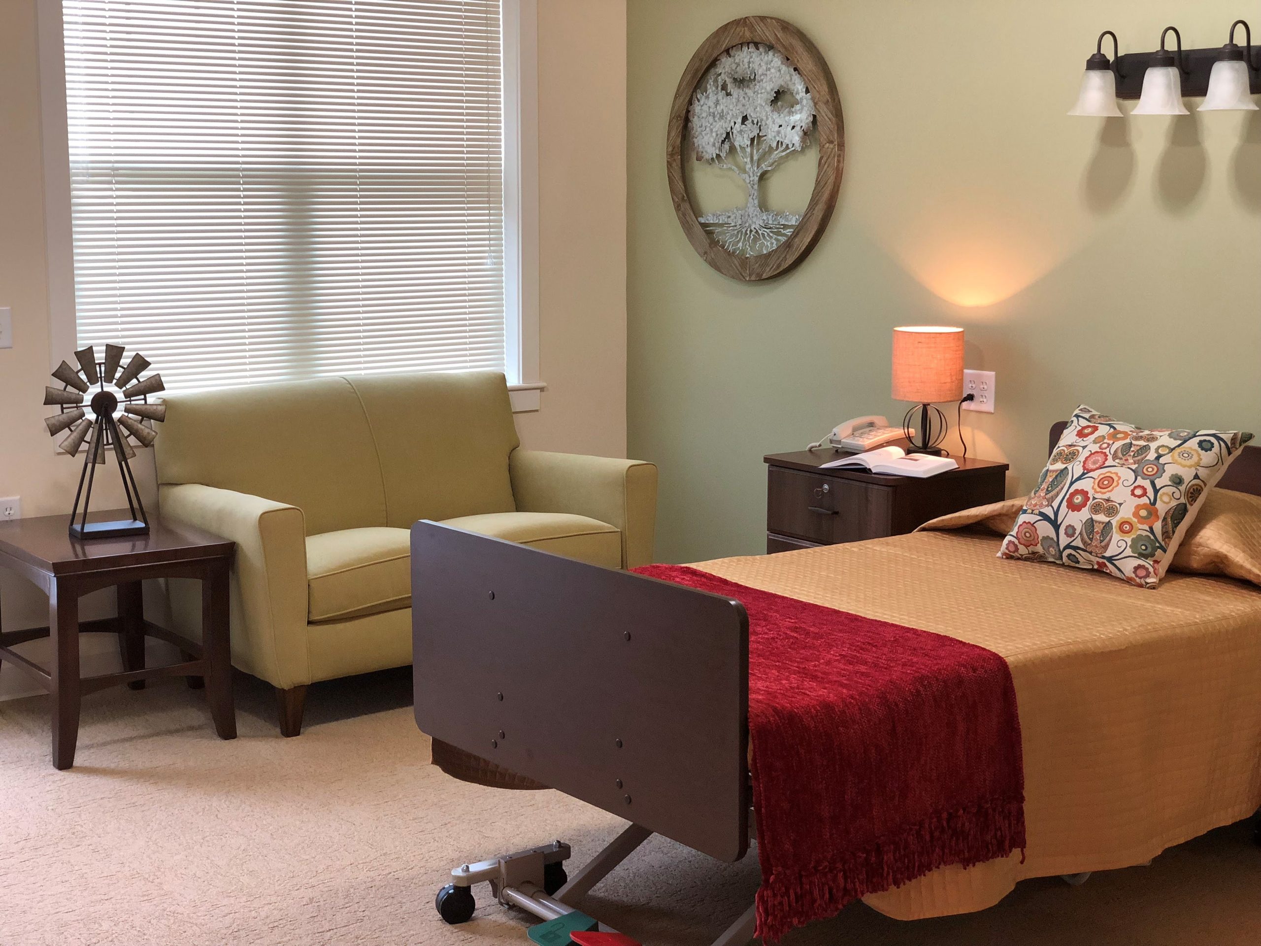 Inside view of a private resident room with seating area
