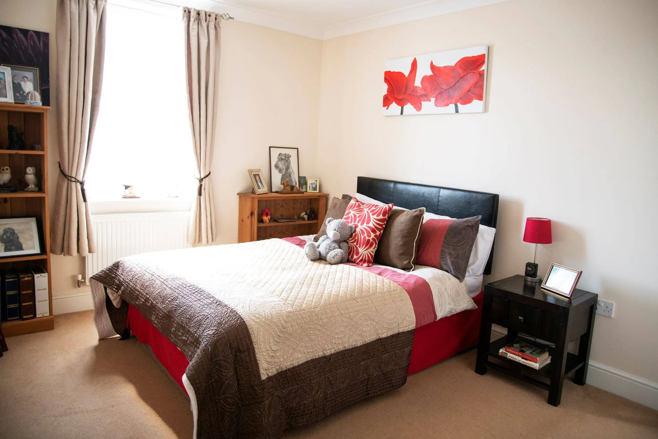 Cozy bedroom with plush bedding and decor
