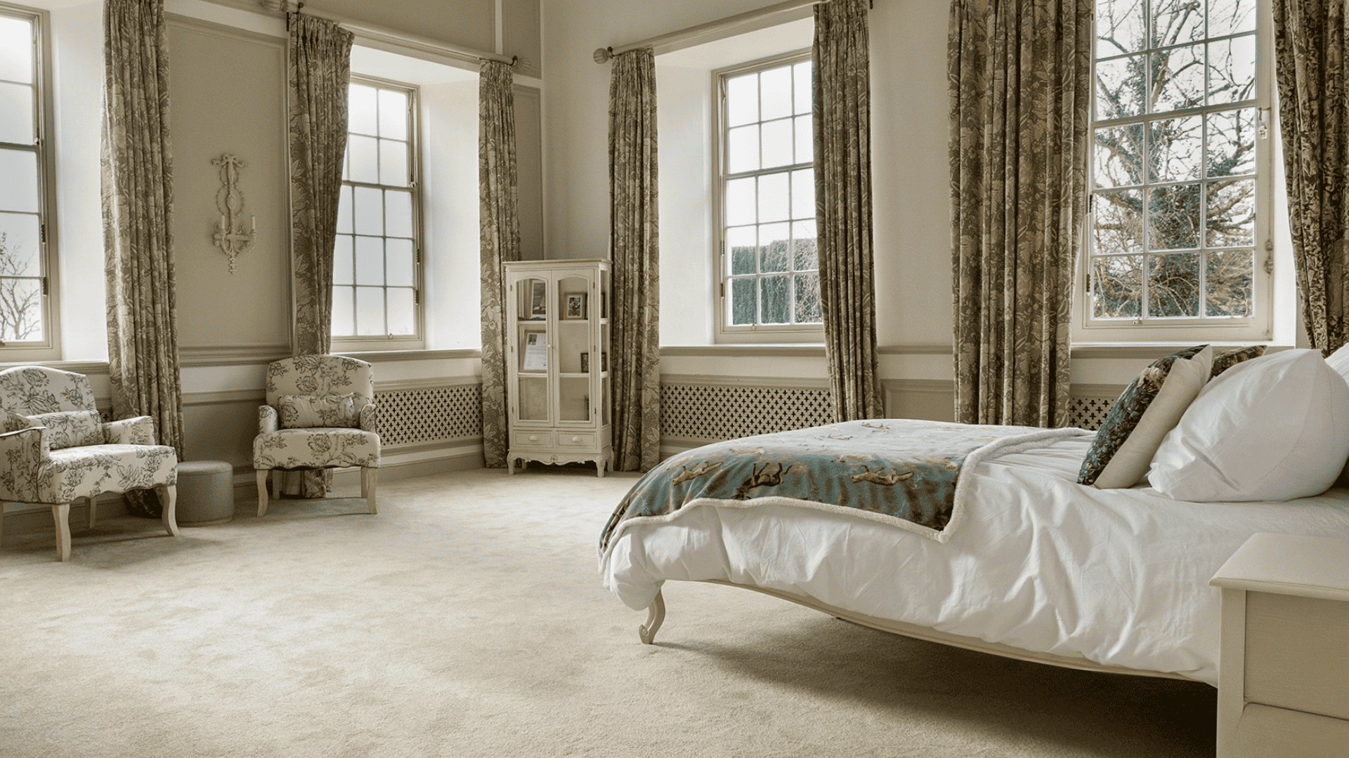 Well-furnished resident room with natural light.