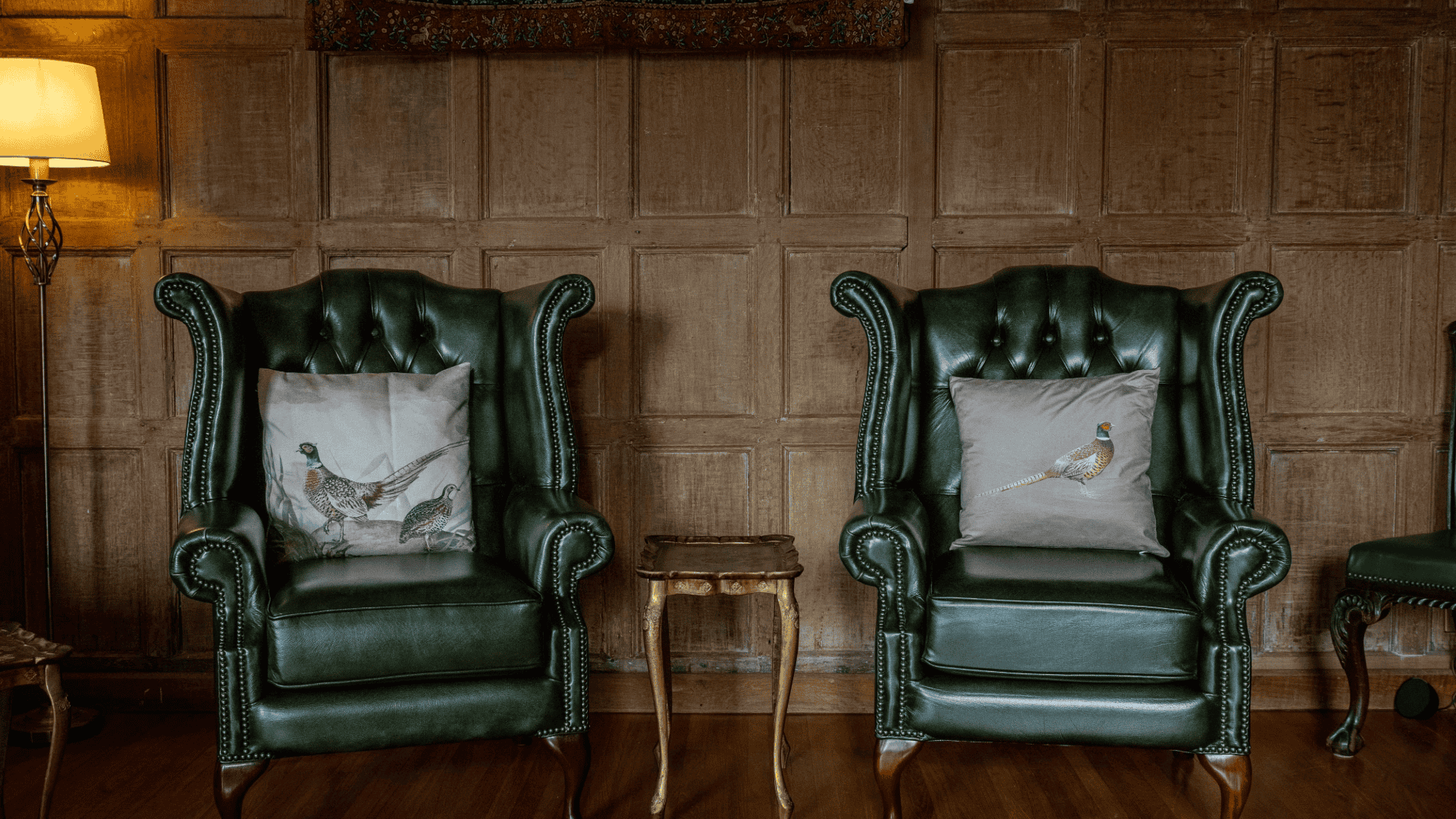 Elegant green armchairs in a cozy setting