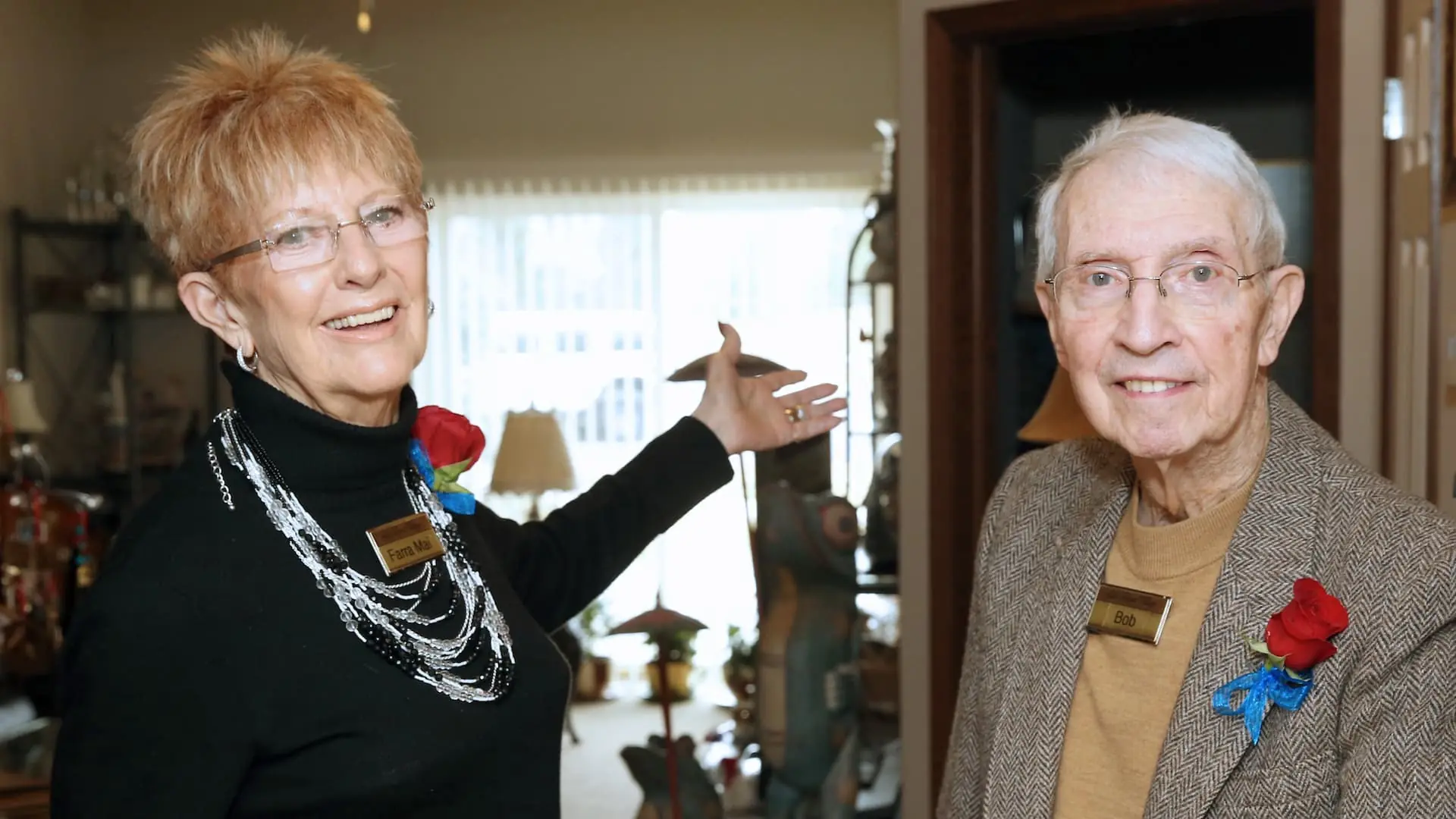 Two residents smiling in a community common area