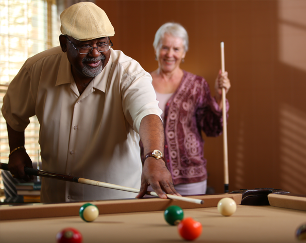 Residents enjoying a fun game of billiards