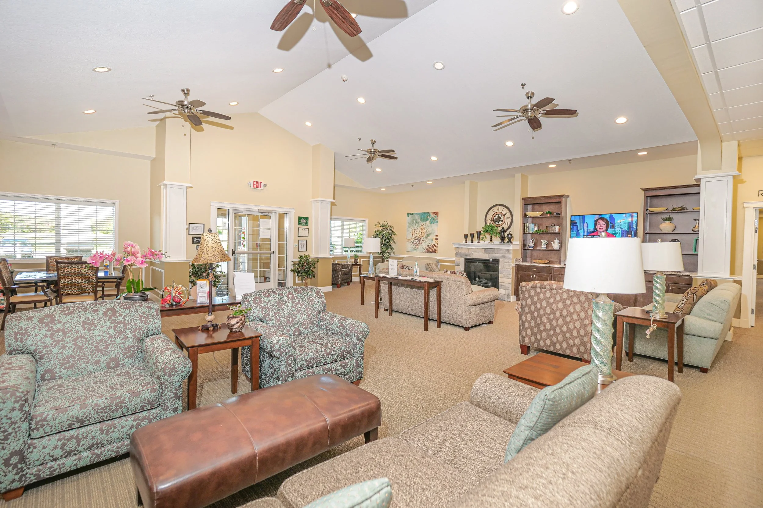 Bright and inviting common area with seating and decor.