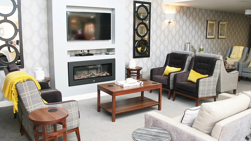 Cozy common area with seating and fireplace