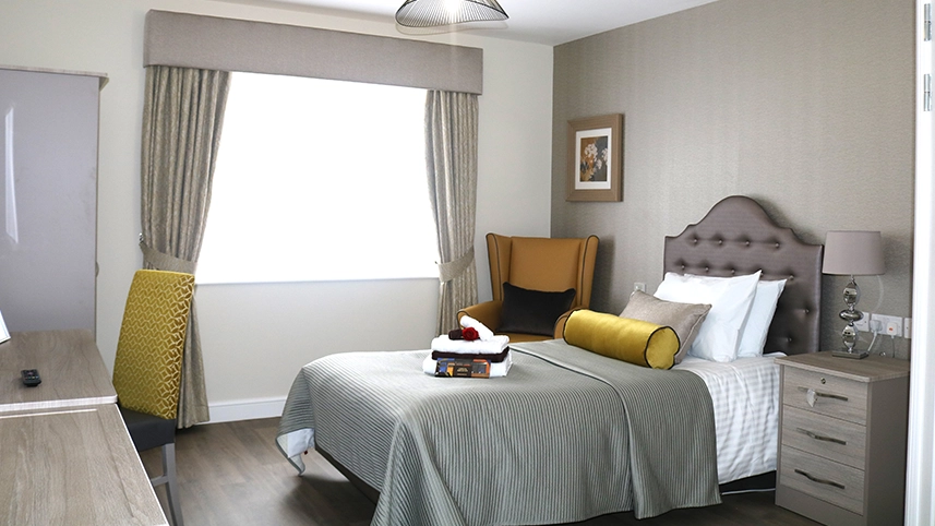 Well-furnished resident room with modern decor