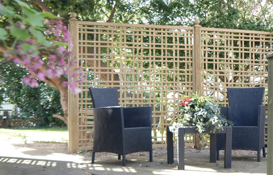 Outdoor seating area with potted plants