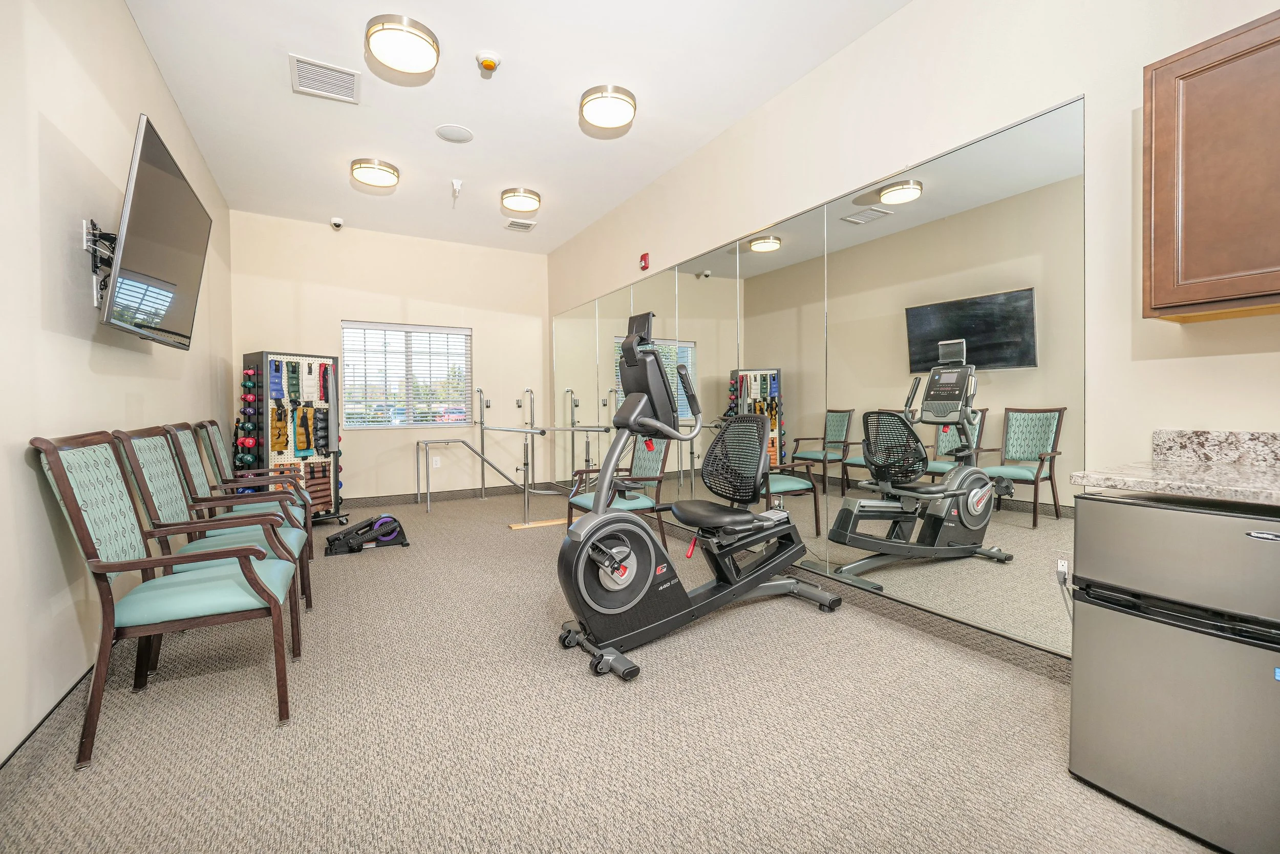 Well-equipped exercise room with gym equipment