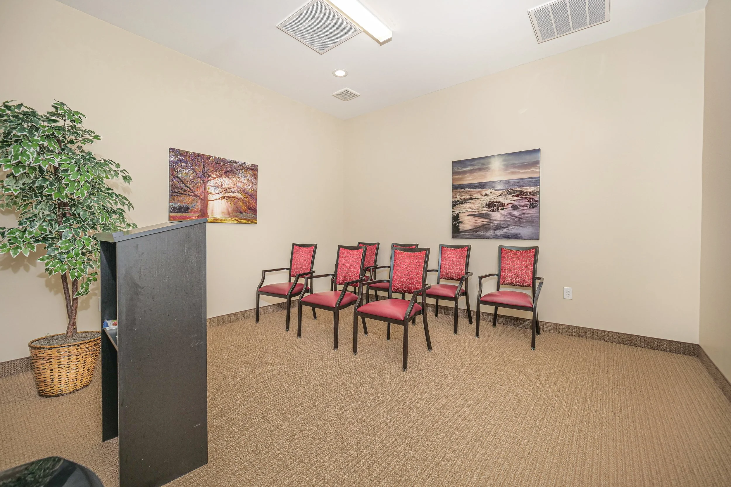 Empty seating area with art on the walls