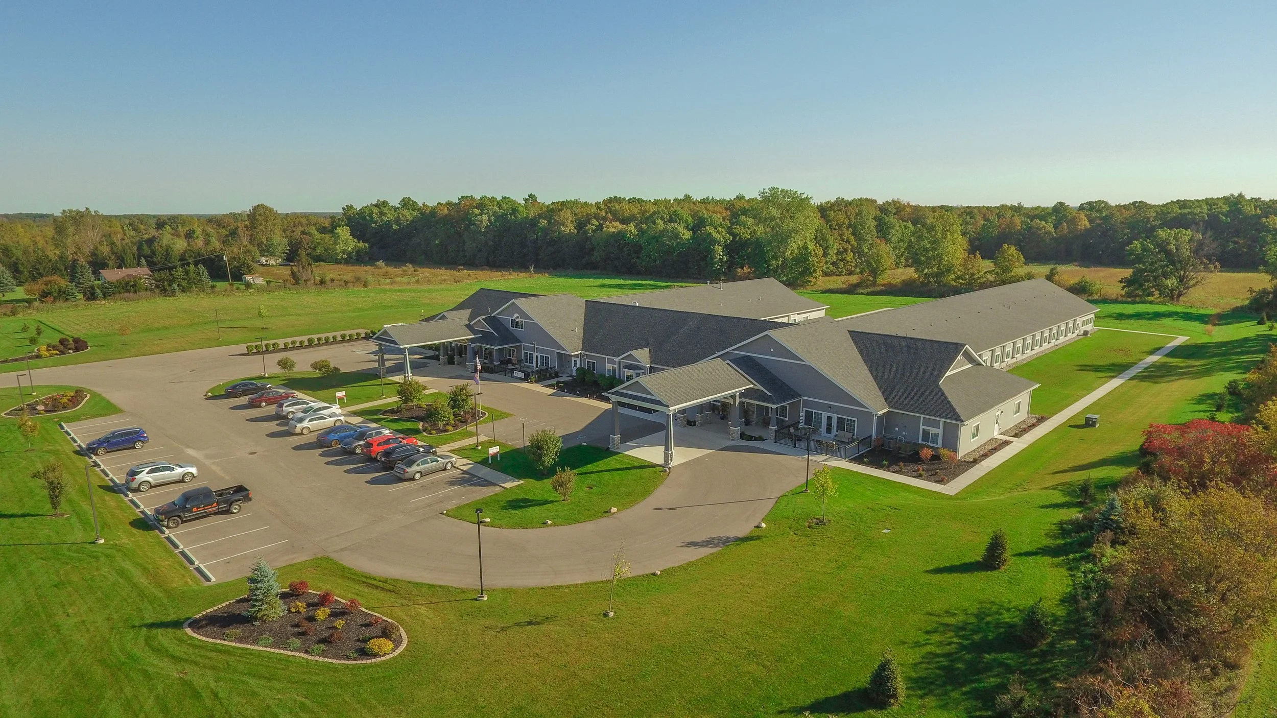 Aerial view of Howell's Care 3 facility with landscaped grounds.