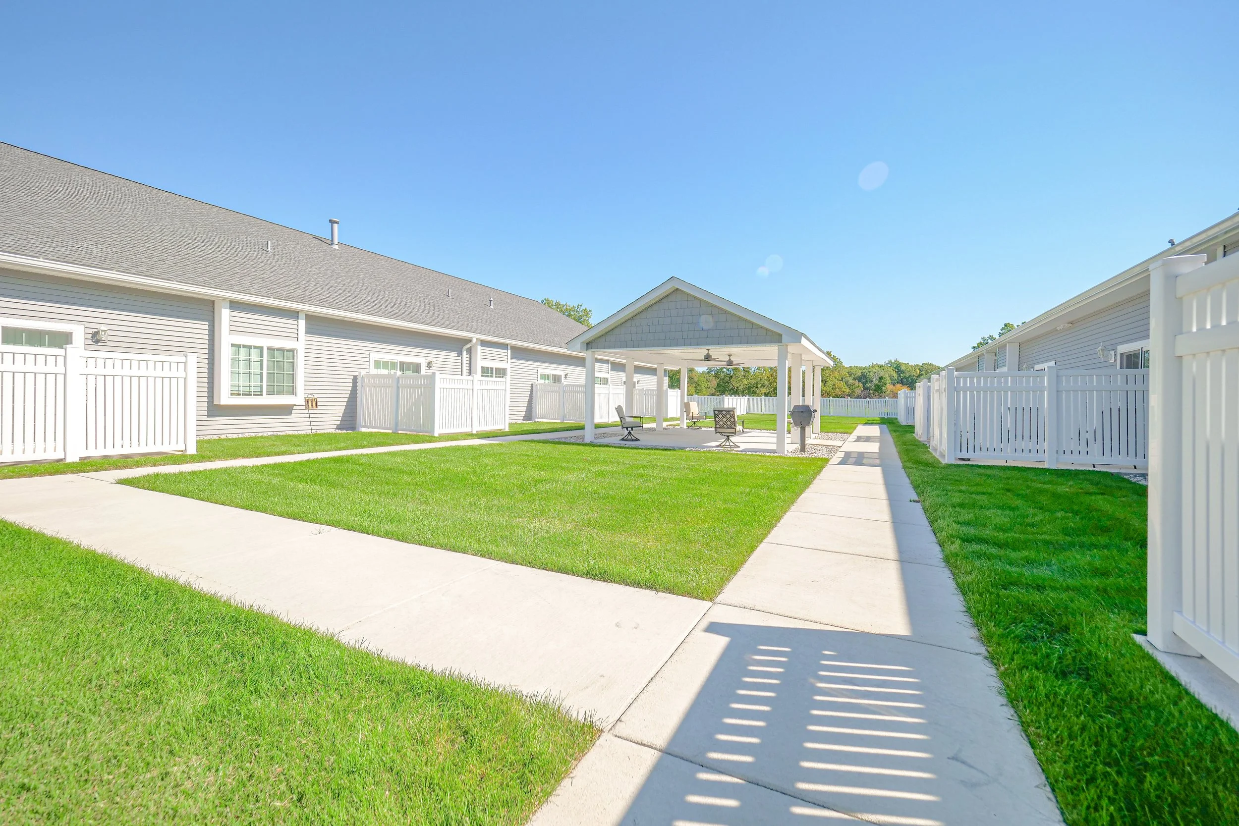 Well-maintained outdoor space with seating areas