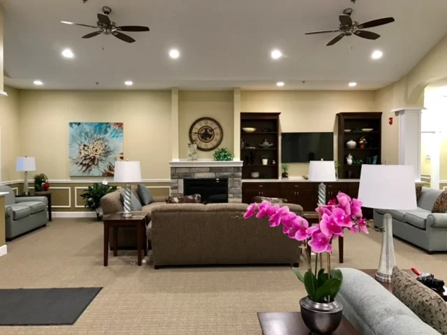 Spacious common area with comfortable seating and decor.