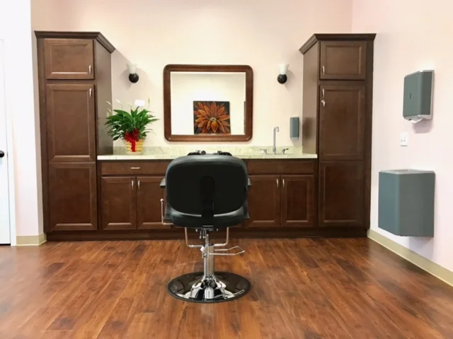 Barber chair in an interior hair salon space