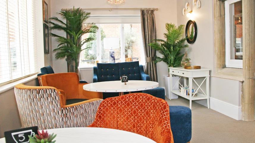 Cozy common area with seating and plants