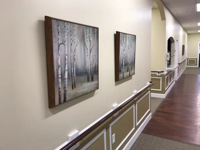 Hallway with framed nature art