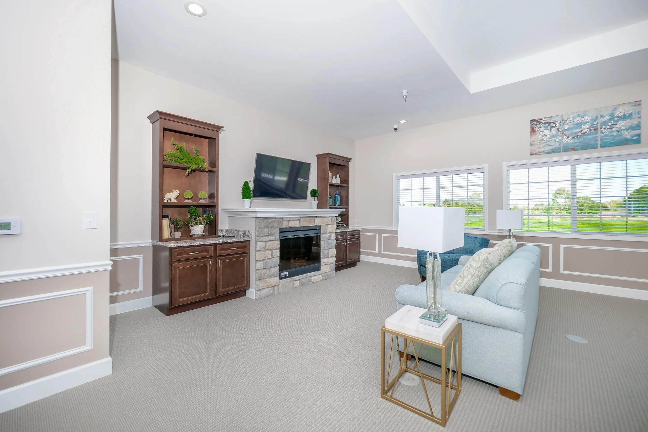 Cozy common area with a fireplace and seating
