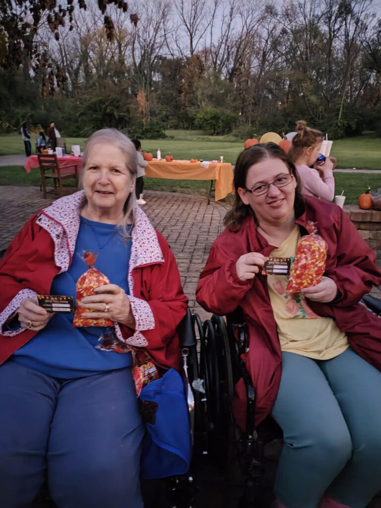 Two residents enjoying an outdoor event