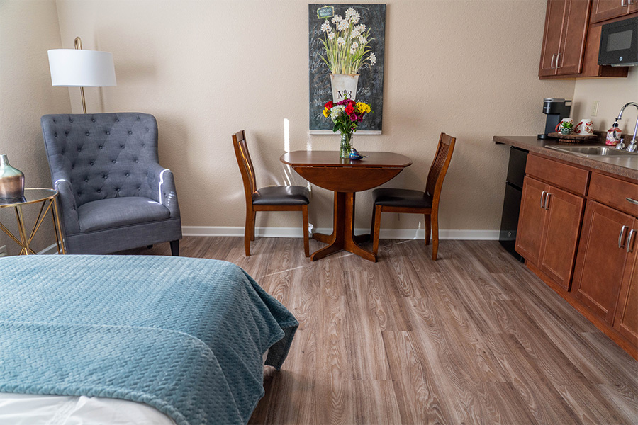 Cozy interior of a resident room with furniture and decor