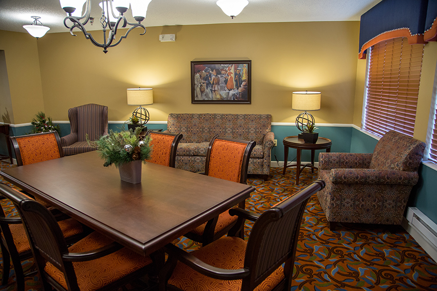 Cozy common area with seating and dining table