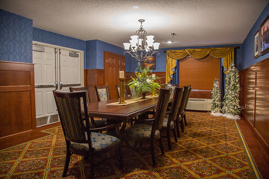 Well-decorated dining room with large table and chairs