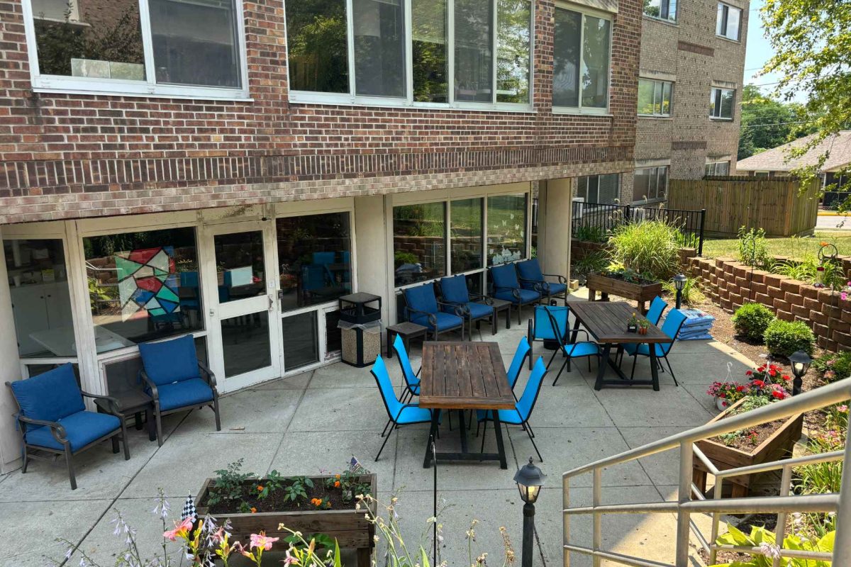 Outdoor seating area with tables and chairs
