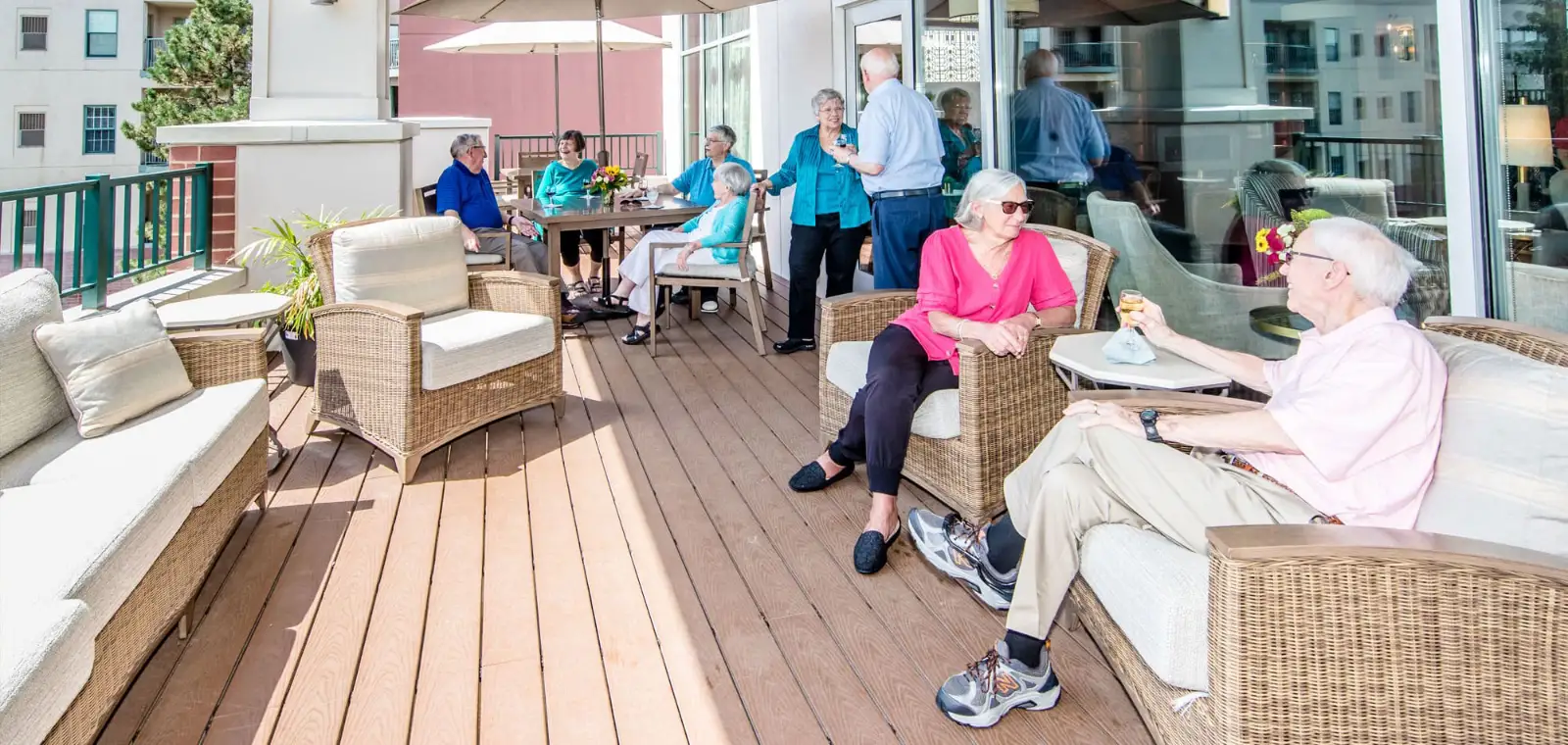 Residents enjoying an outdoor lounge area