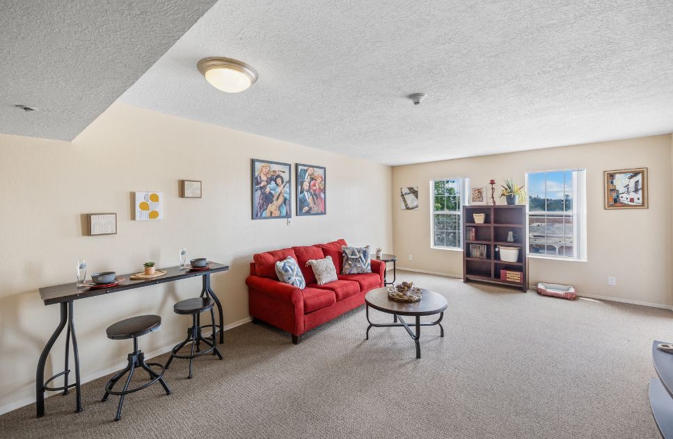 Interior view of a cozy common area with seating