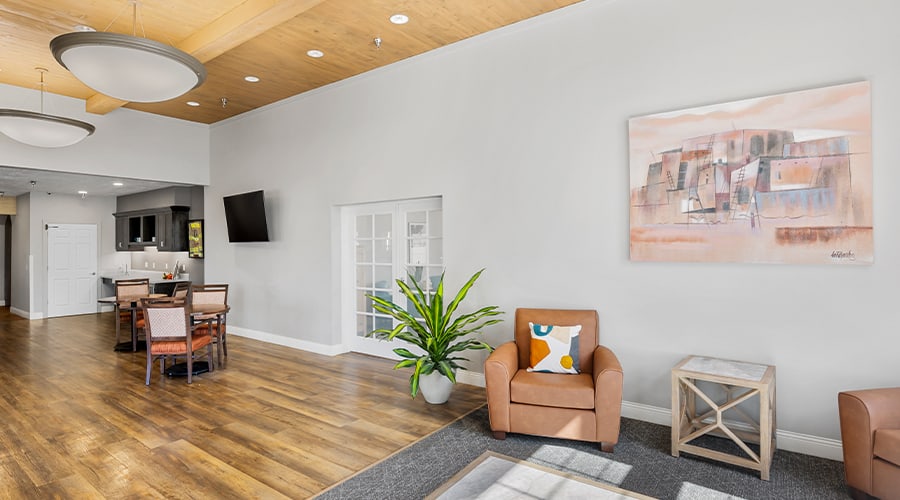 Bright common area with seating and decor