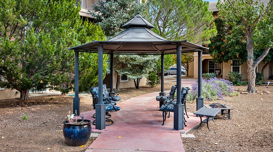 Outdoor gazebo seating area in a garden