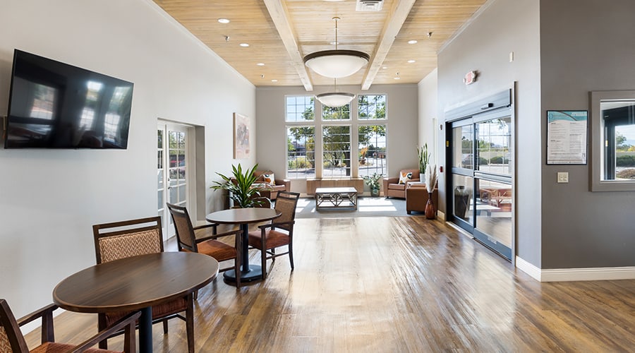 Bright interior common area with seating and decor
