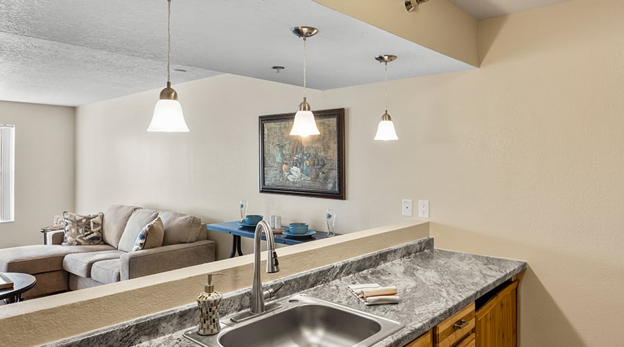 Bright and clean interior common area with a kitchen sink
