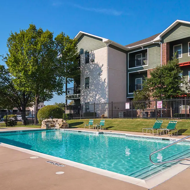 Swimming pool area surrounded by residential buildings
