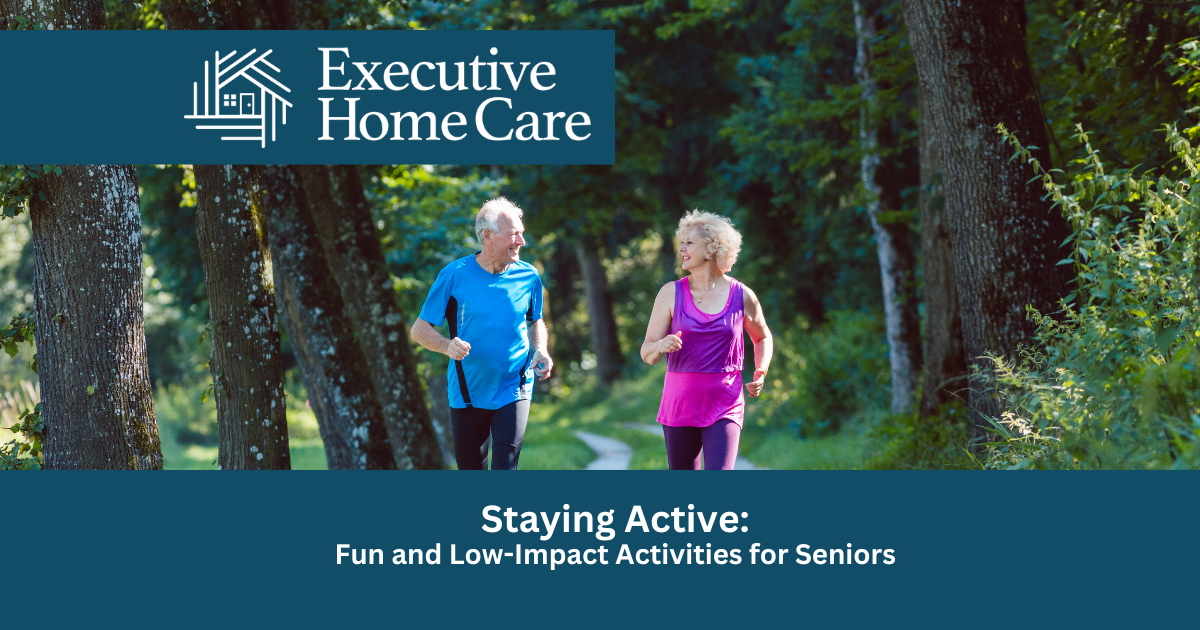 Two seniors jogging on a path surrounded by trees.
