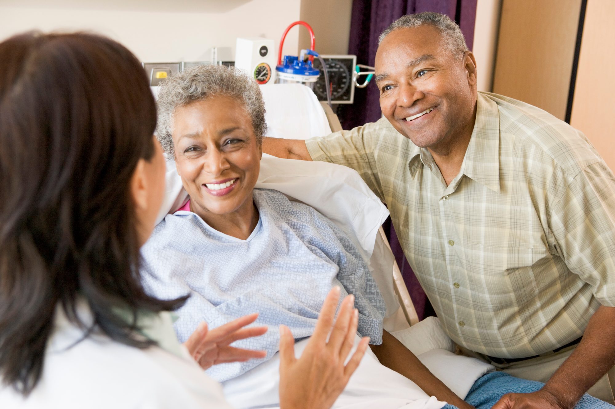 Senior couple visiting with a healthcare provider