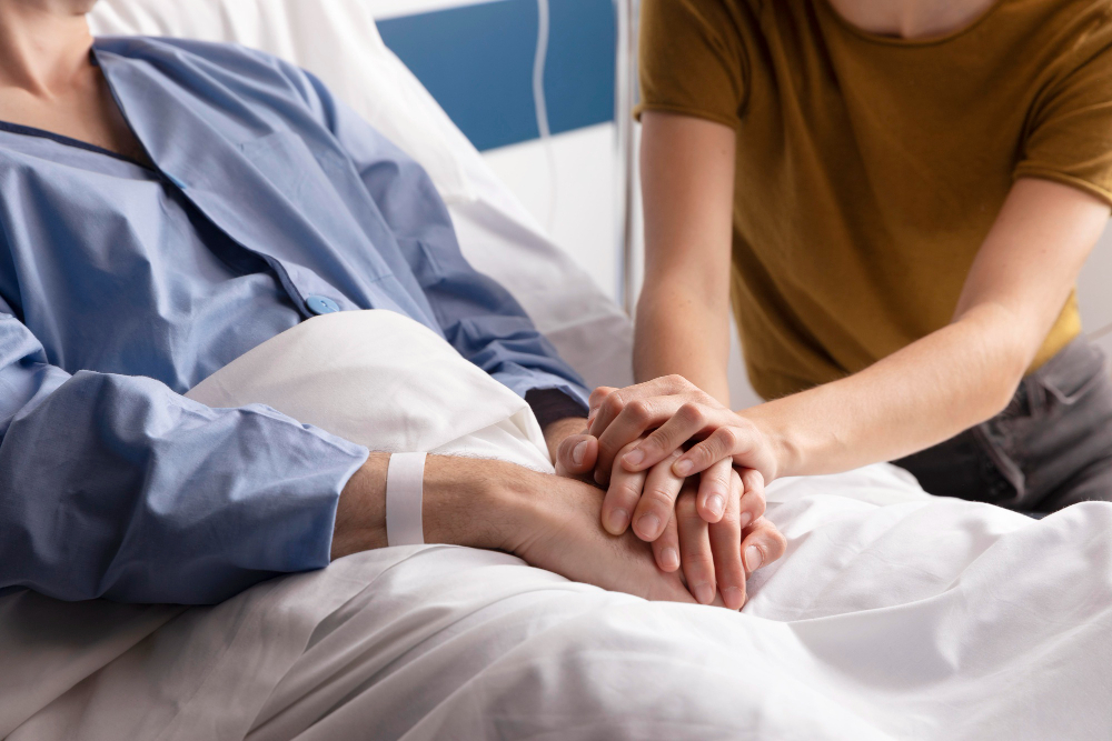Close-up of hands in a caring gesture