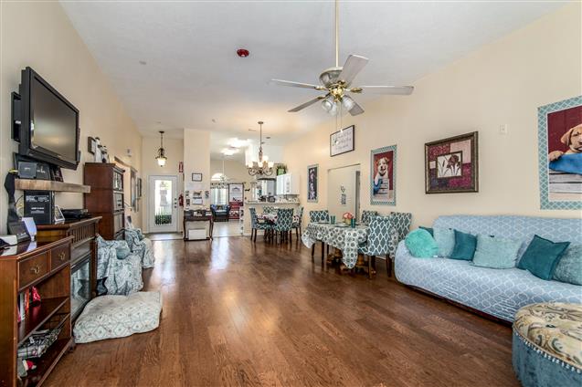 Common area with seating and decor in a senior living space