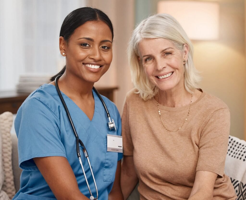 Nurse and resident posing together happily.
