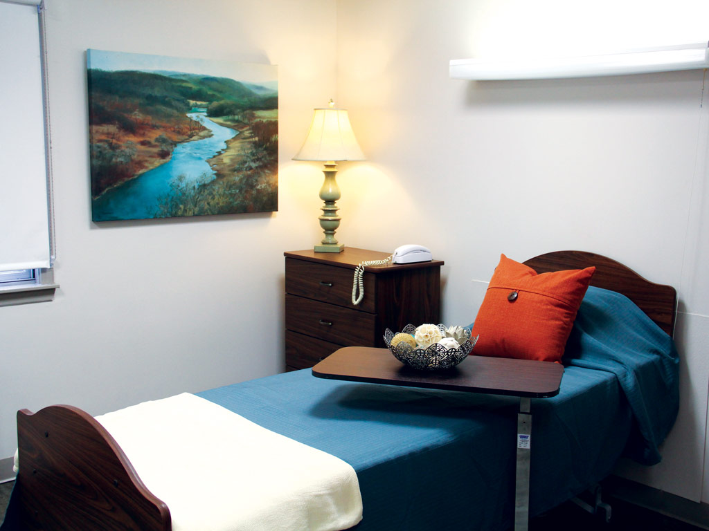 Cozy resident room with a painting and lamp