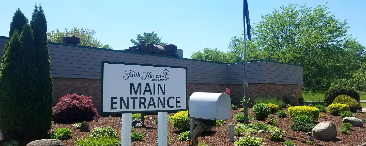 Main entrance sign of Faith Haven Senior Care Center.