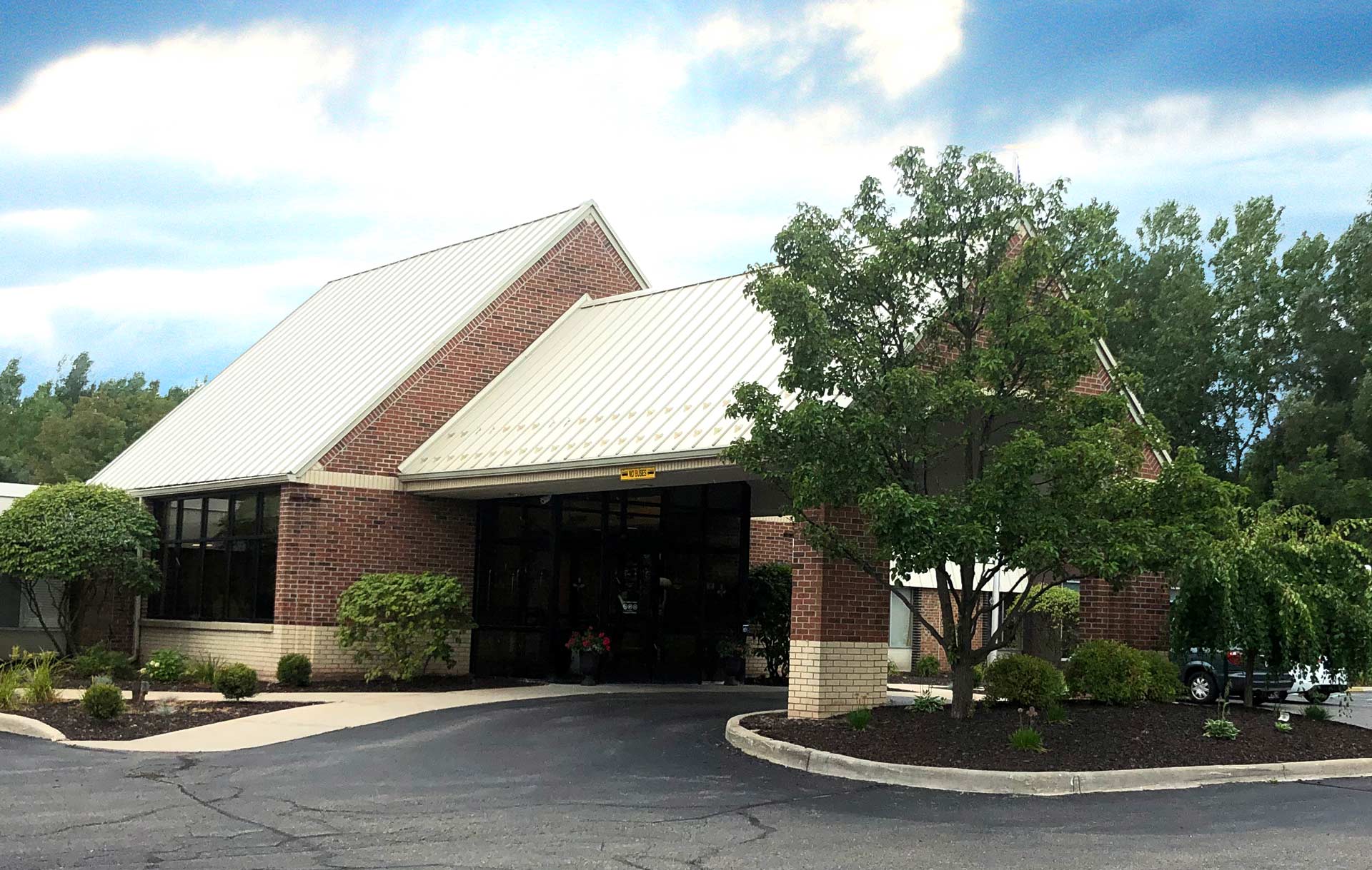 Exterior view of West Oaks Senior Care and Rehab Center.