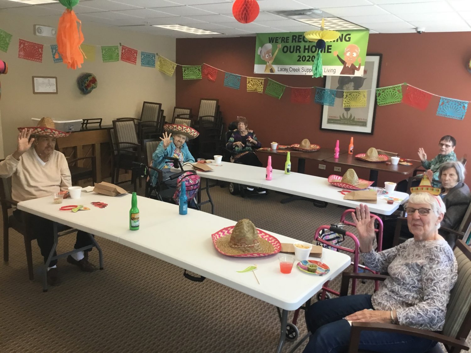 Residents celebrating with decorations and sombreros