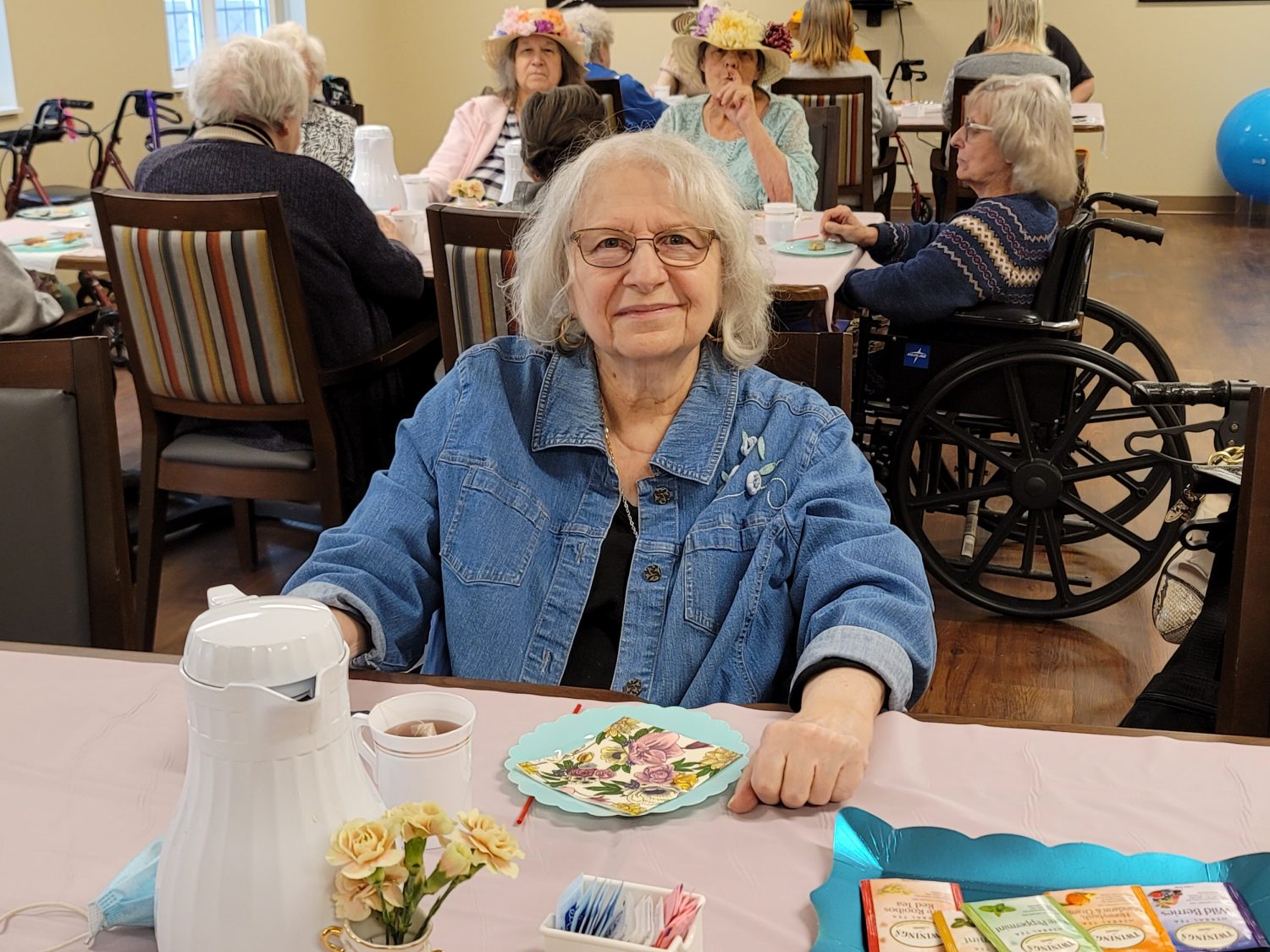 Resident enjoying a meal in the dining room