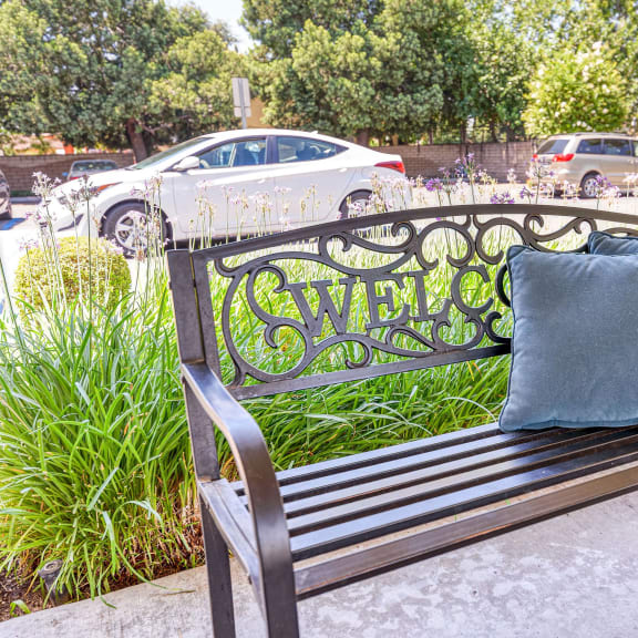 Welcoming bench outside a senior living facility