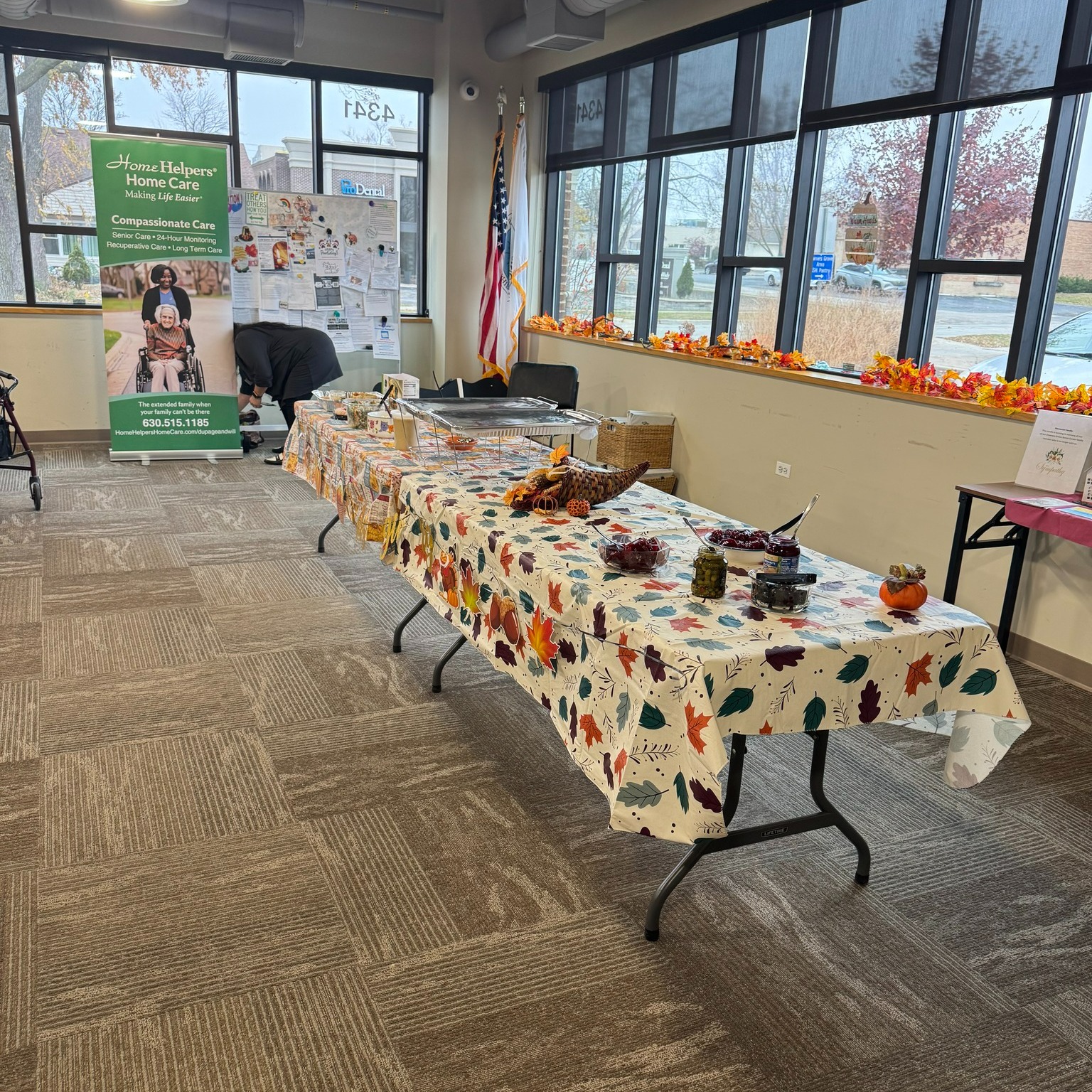 Decorated table for an event with fall-themed items