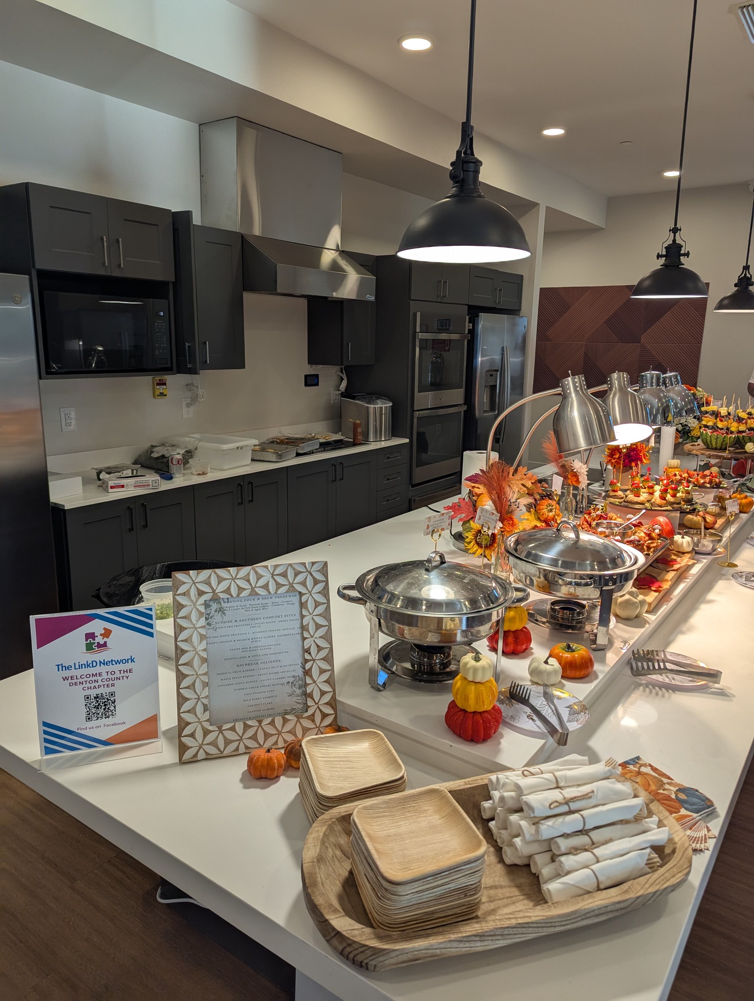 Dining area with a buffet setup for a celebration