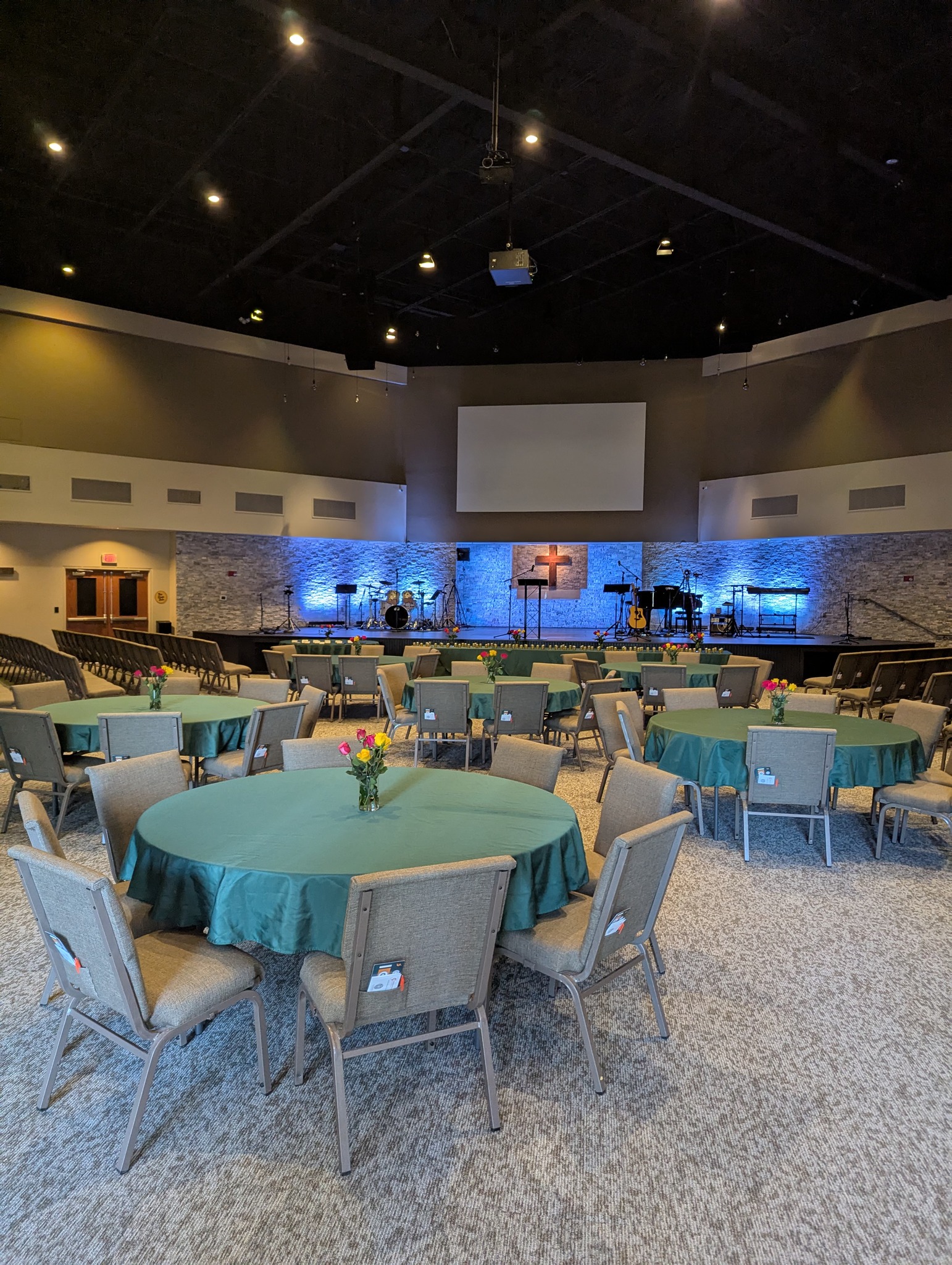 Interior view of a multi-purpose activity room with tables