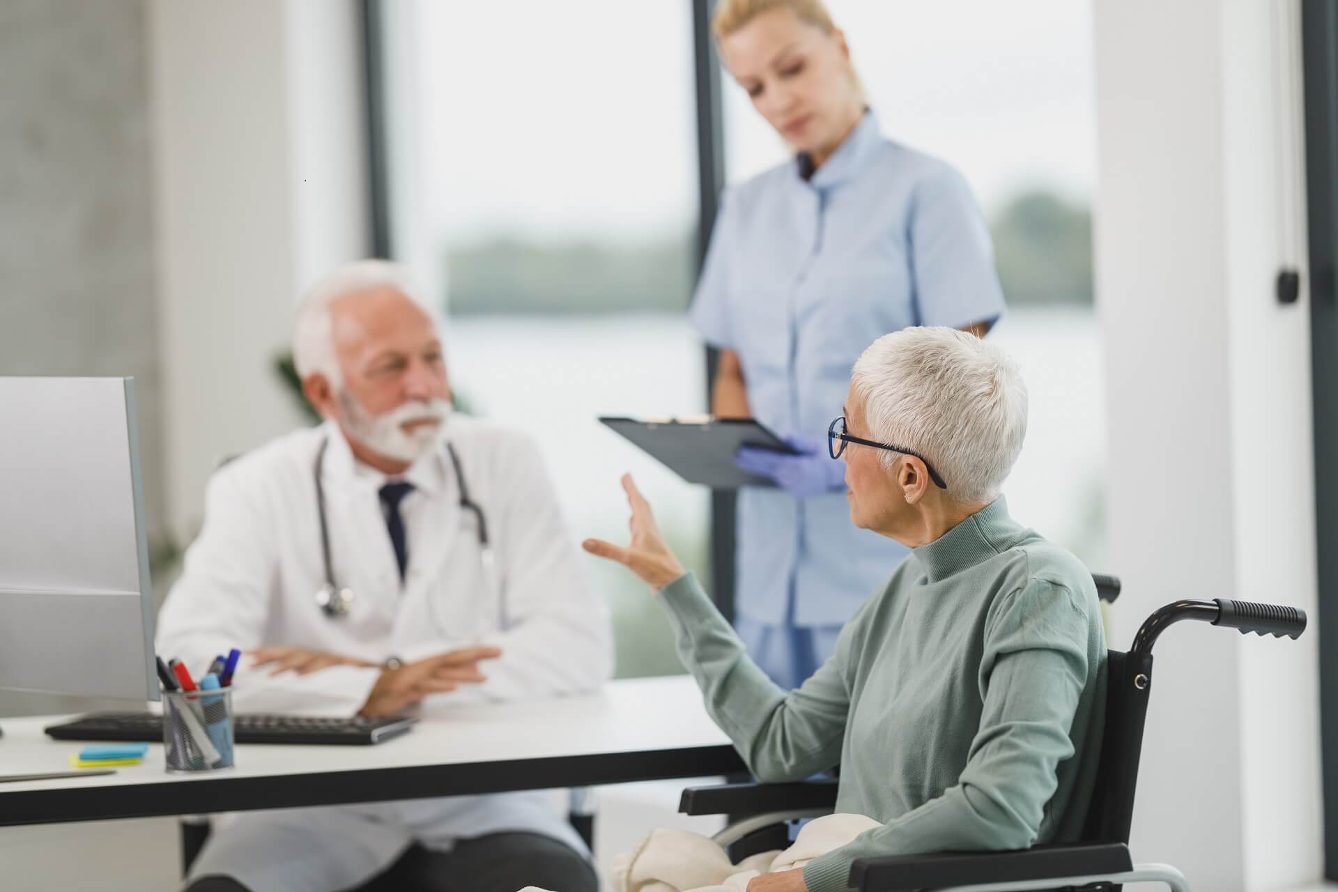 Healthcare professional consulting with a senior resident.