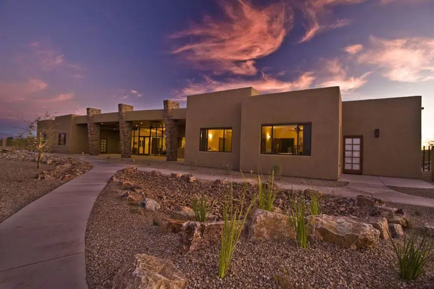 Exterior view of a nursing home at sunset.