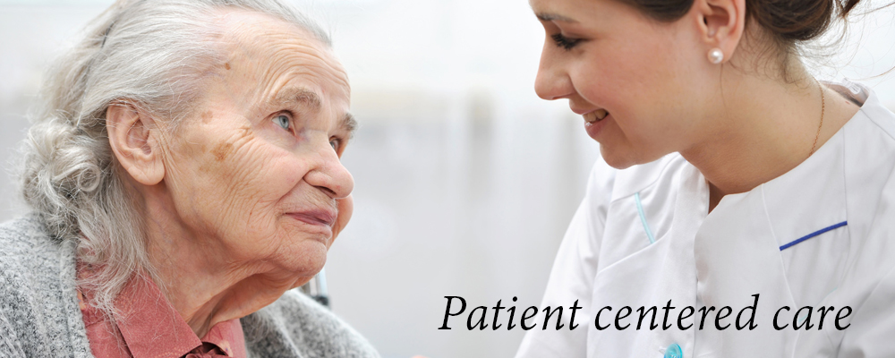 A caregiver engaging with an elderly resident.