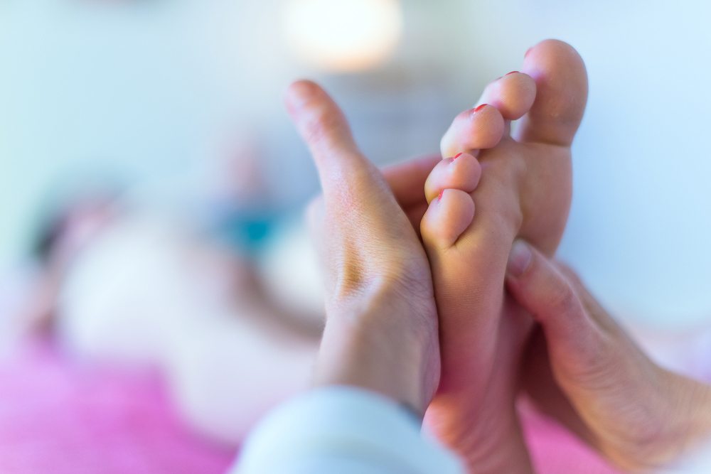 Close-up of a foot massage session.