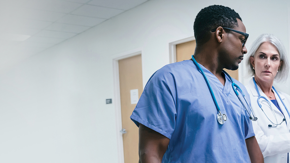 Healthcare professionals in a corridor